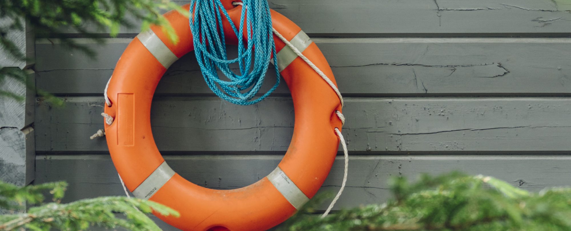 Life Preserver Over Wooden Wall